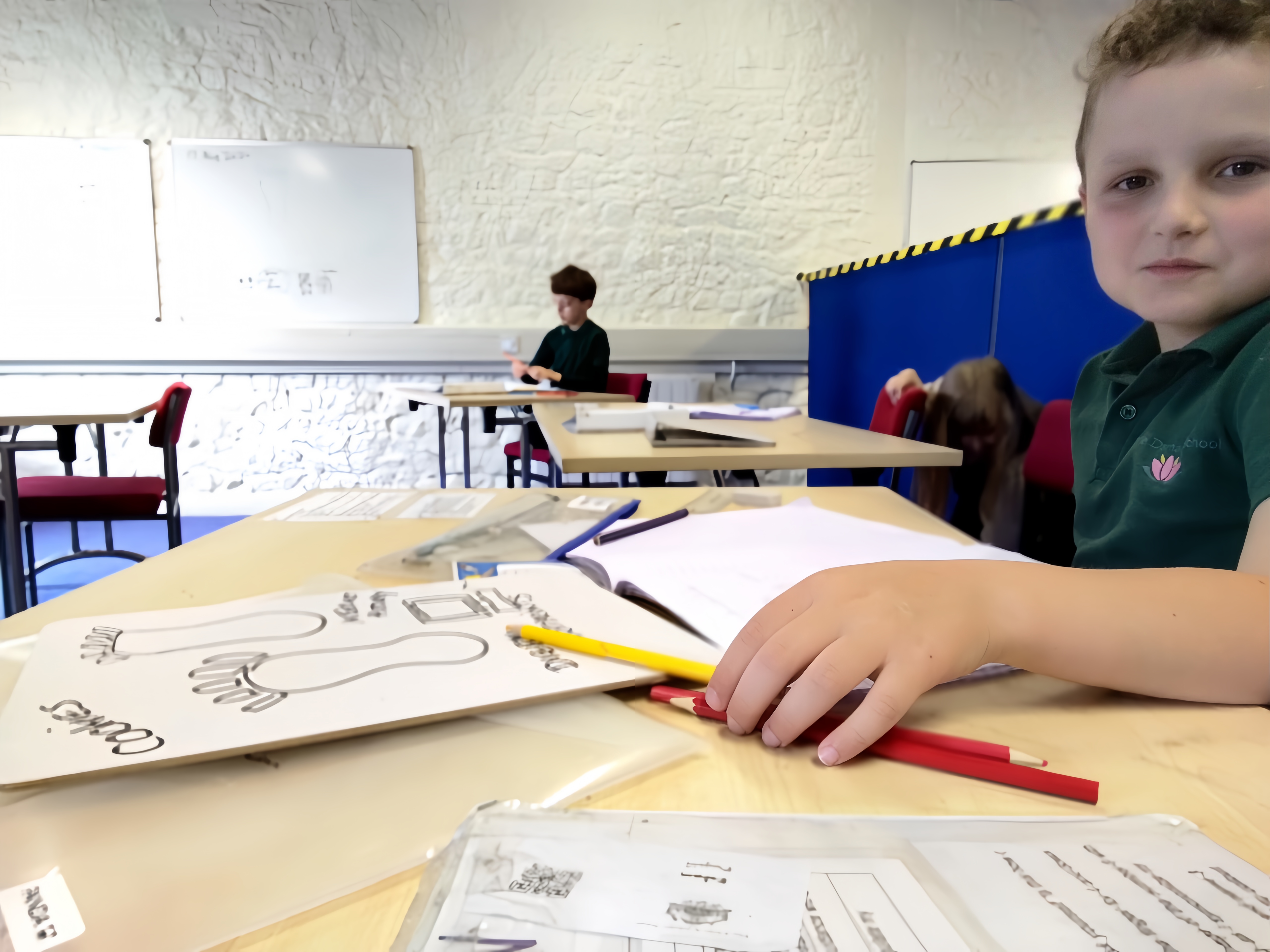 student at his desk